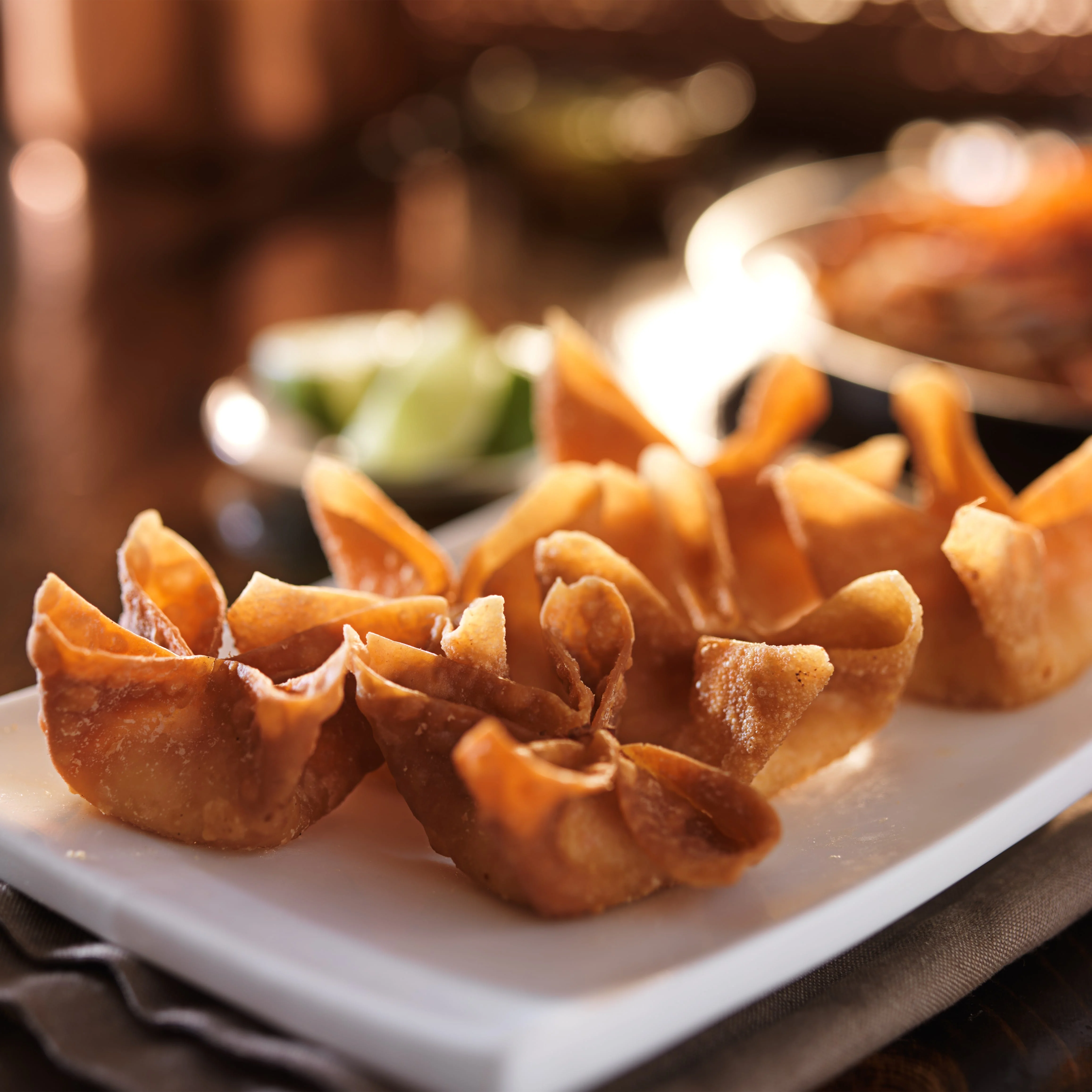 Crab Rangoons - Crispy fried wontons filled with cream cheese and crab