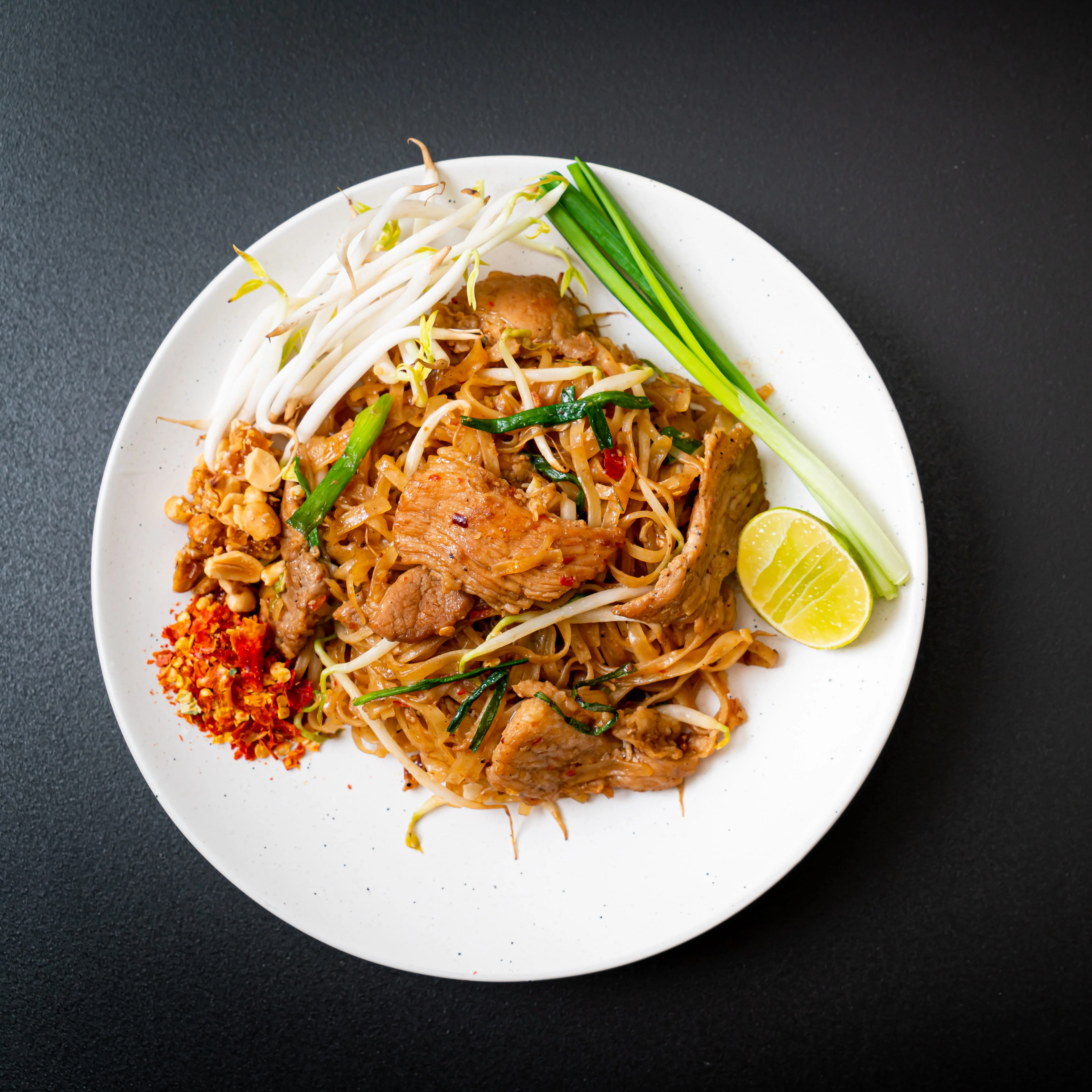 Pad Thai - Classic stir-fried rice noodles with bean sprouts and peanuts